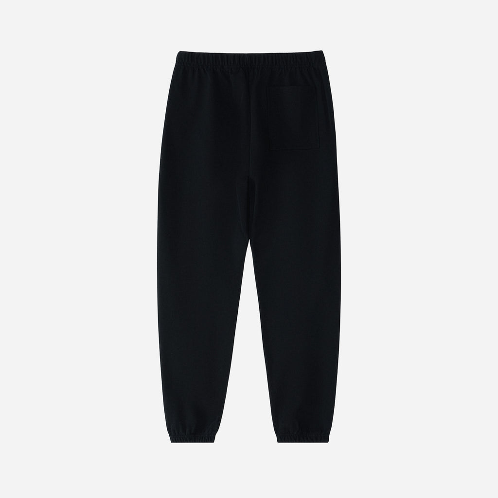 Black pants on a light gray background