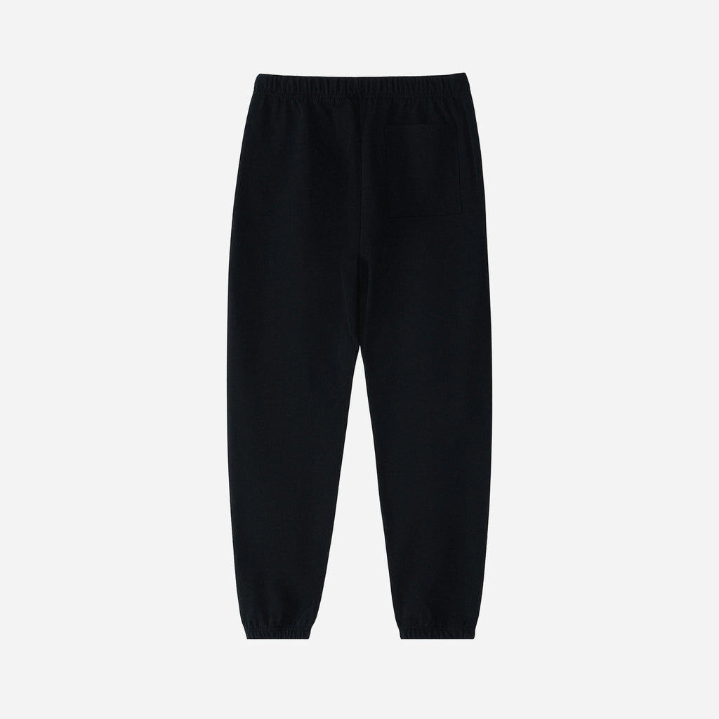 Black pants on a light gray background