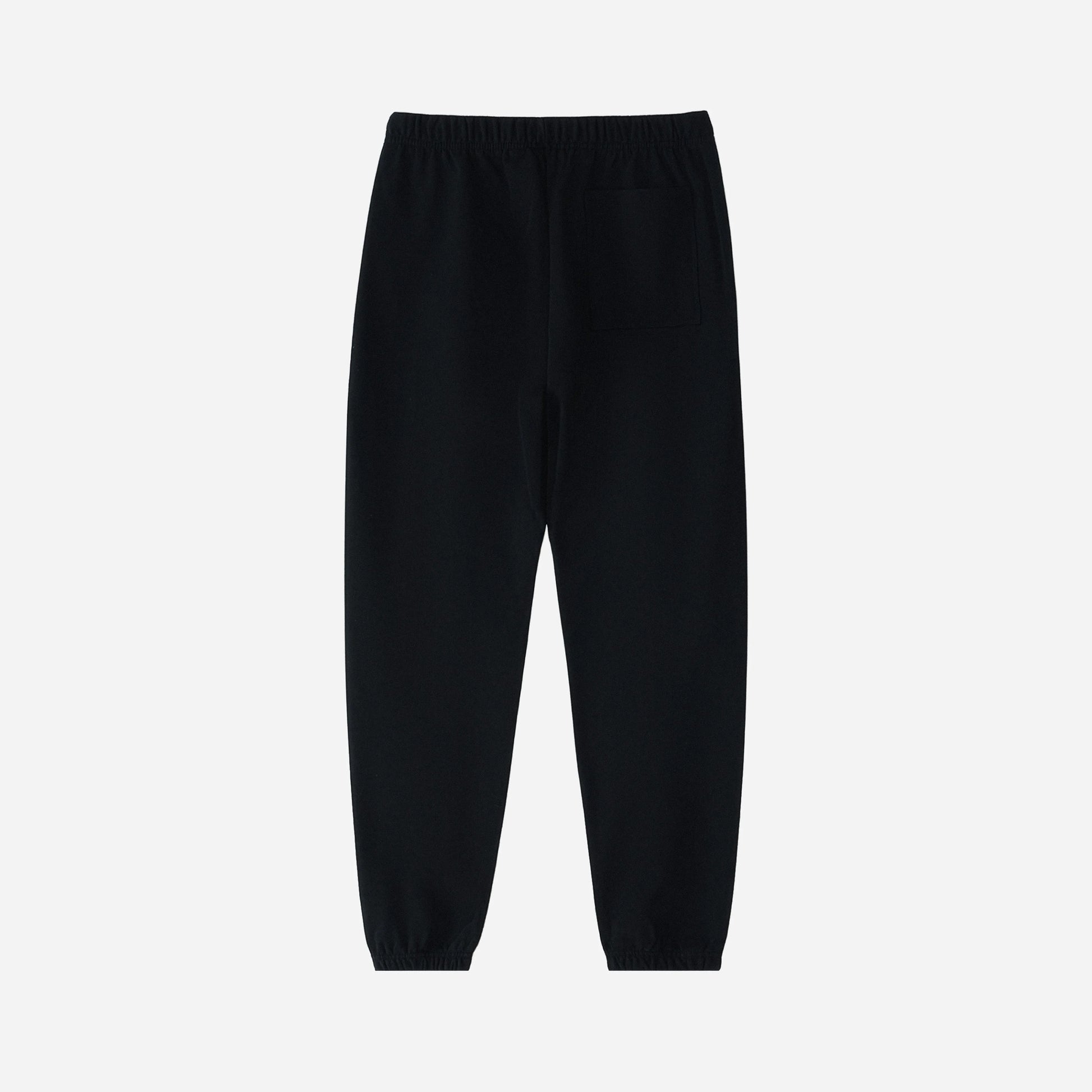 Black pants on a light gray background