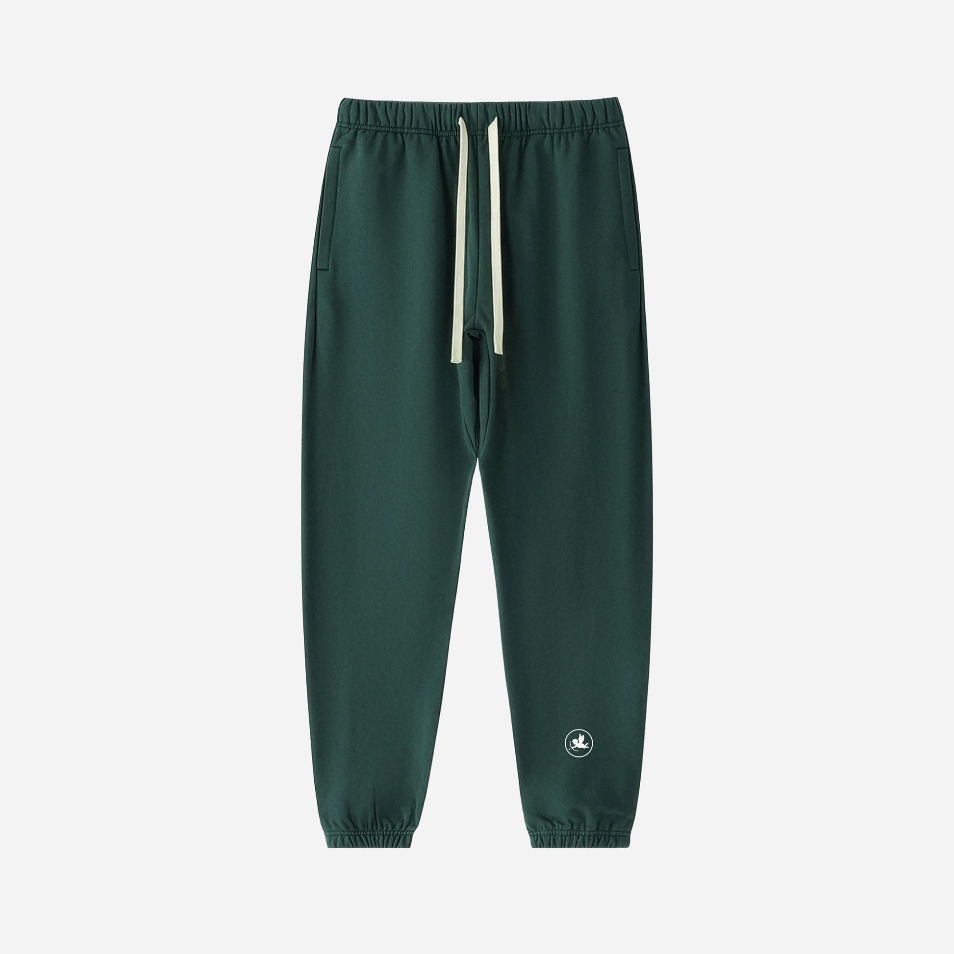 Green jogger pants with a small logo on a light gray background